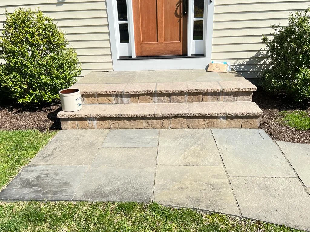 Front entry walkway and raised stone stoop landscaping project